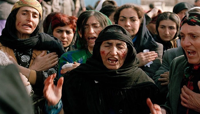 “Üzünün yarısı kəsilmişdi...” - Rusiya mətbuatı Xocalı soyqırımı haqda